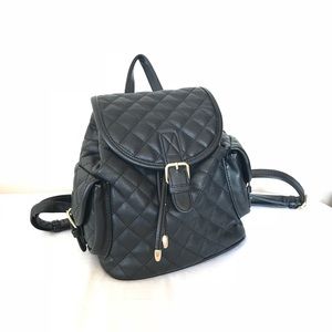 Black quilted backpack